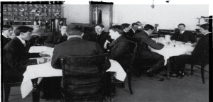   Members of the Poison Squad dine at the 'hygienic table' located in the former Bureau of Chemistry building in Washington, D.C. Experiments conducted there a century ago by Harvey W. Wiley. MD. were designed to test the safety of food preservatives.