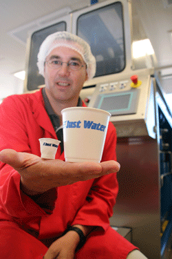 Dr Jon Palmer with a Styrofoam cup that has been subjected to high-pressure pasteurisation