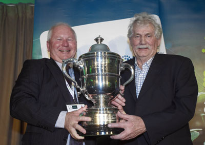 Horticulture New Zealand president Andrew Fenton presents the horticulture industry's premier award, the Bledisloe Cup, to long time industry advocate and grower Con Van der Voort