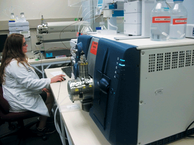Greer Tanner-Dempsey operates Hill Laboratories' LCMS/MS machine